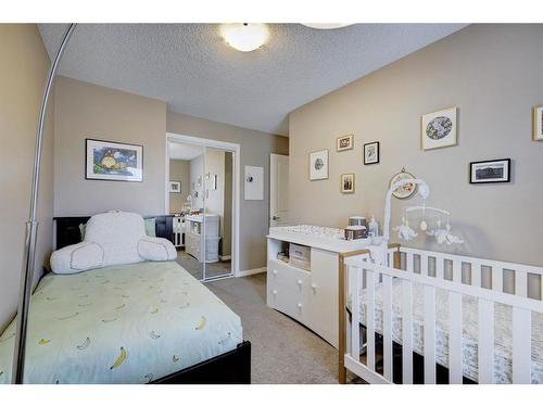 1587 Windstone Road Sw, Airdrie, AB - Indoor Photo Showing Bedroom