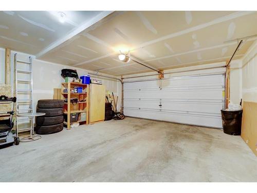 1587 Windstone Road Sw, Airdrie, AB - Indoor Photo Showing Garage