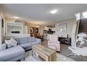 1587 Windstone Road Sw, Airdrie, AB  - Indoor Photo Showing Living Room With Fireplace 