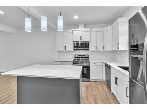 155 Wolf Creek Avenue Se, Calgary, AB - Indoor Photo Showing Kitchen With Upgraded Kitchen