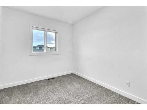 155 Wolf Creek Avenue Se, Calgary, AB - Indoor Photo Showing Other Room