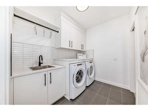 29 Timberline Court Sw, Calgary, AB - Indoor Photo Showing Laundry Room