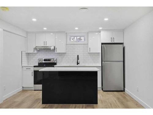 7 Deerbow Place Se, Calgary, AB - Indoor Photo Showing Kitchen With Upgraded Kitchen