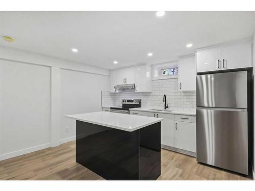 7 Deerbow Place Se, Calgary, AB - Indoor Photo Showing Kitchen With Upgraded Kitchen