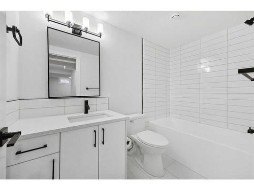 7 Deerbow Place Se, Calgary, AB - Indoor Photo Showing Bathroom