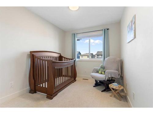 117 Heartland Street, Cochrane, AB - Indoor Photo Showing Bedroom