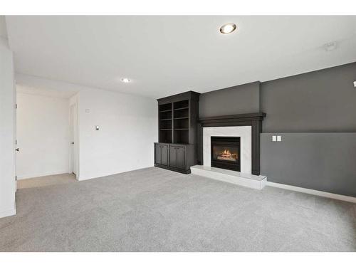 505 Lakeside Greens Place, Chestermere, AB - Indoor With Fireplace