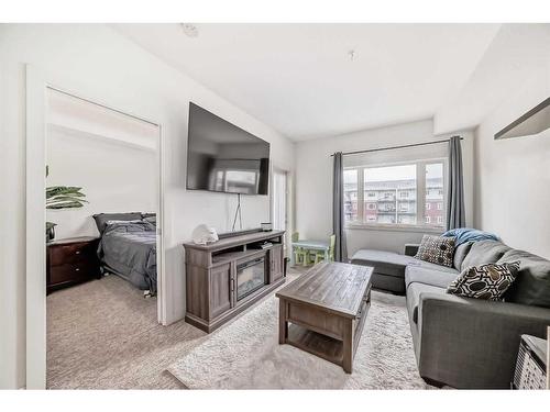 304-23 Millrise Drive Sw, Calgary, AB - Indoor Photo Showing Living Room