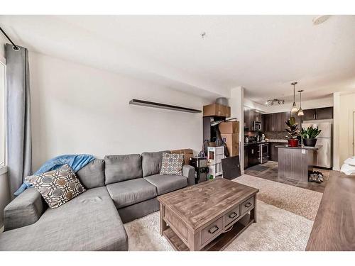 304-23 Millrise Drive Sw, Calgary, AB - Indoor Photo Showing Living Room