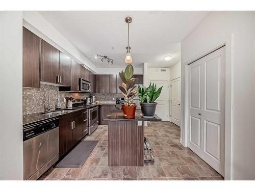 304-23 Millrise Drive Sw, Calgary, AB - Indoor Photo Showing Kitchen With Upgraded Kitchen