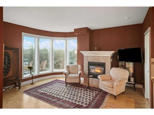 401-4 14 Street Nw, Calgary, AB - Indoor Photo Showing Living Room With Fireplace