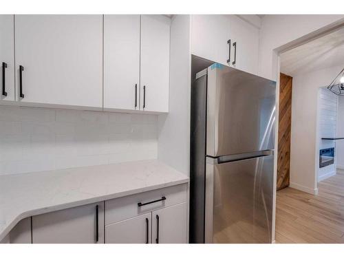 19-11407 Braniff Road Sw, Calgary, AB - Indoor Photo Showing Kitchen