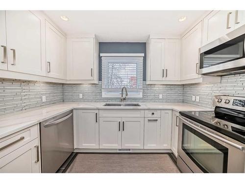 103 Windermere Road Sw, Calgary, AB - Indoor Photo Showing Kitchen With Upgraded Kitchen