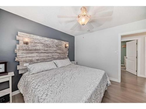 103 Windermere Road Sw, Calgary, AB - Indoor Photo Showing Bedroom