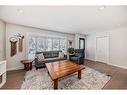 103 Windermere Road Sw, Calgary, AB  - Indoor Photo Showing Living Room 