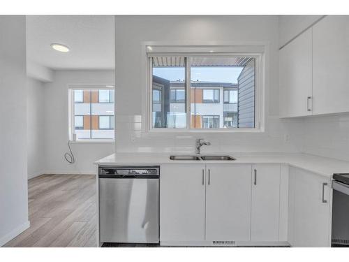 864 Cornerstone Boulevard Ne, Calgary, AB - Indoor Photo Showing Kitchen With Double Sink