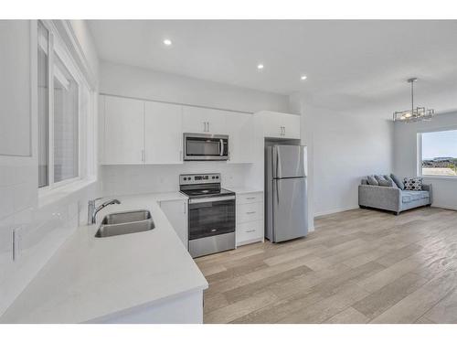 864 Cornerstone Boulevard Ne, Calgary, AB - Indoor Photo Showing Kitchen With Double Sink