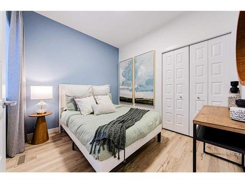 707 Buffaloberry Manor Se, Calgary, AB - Indoor Photo Showing Bedroom