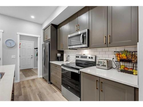 134 Masters Row Se, Calgary, AB - Indoor Photo Showing Kitchen With Upgraded Kitchen