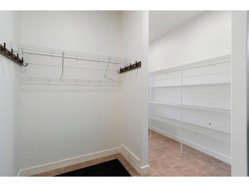 128 Elgin Estates Park Se, Calgary, AB - Indoor With Storage