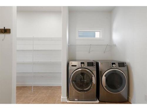 128 Elgin Estates Park Se, Calgary, AB - Indoor Photo Showing Laundry Room