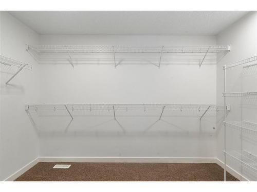 128 Elgin Estates Park Se, Calgary, AB - Indoor With Storage