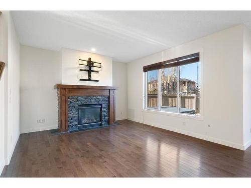 128 Elgin Estates Park Se, Calgary, AB - Indoor Photo Showing Living Room With Fireplace