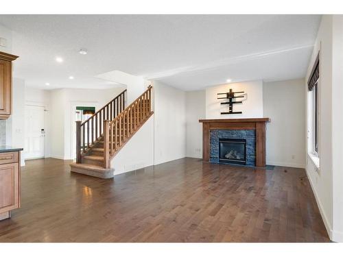 128 Elgin Estates Park Se, Calgary, AB - Indoor Photo Showing Living Room With Fireplace