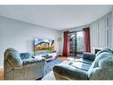 165 Castlebrook Way Ne, Calgary, AB  - Indoor Photo Showing Living Room 