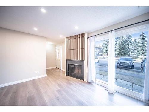 70-2519 38 Street Ne, Calgary, AB - Indoor With Fireplace