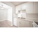 70-2519 38 Street Ne, Calgary, AB  - Indoor Photo Showing Kitchen With Double Sink With Upgraded Kitchen 