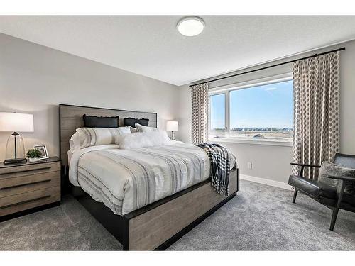 264 Northern Lights Crescent, Langdon, AB - Indoor Photo Showing Bedroom