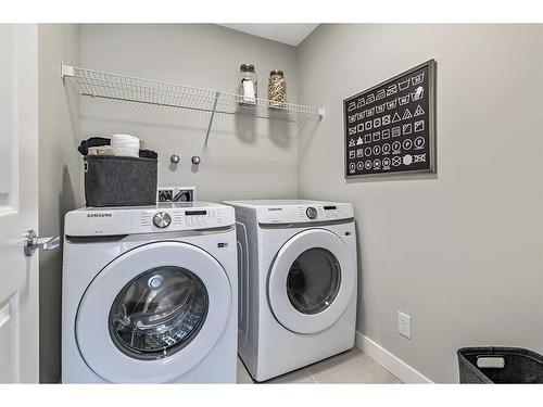 264 Northern Lights Crescent, Langdon, AB - Indoor Photo Showing Laundry Room