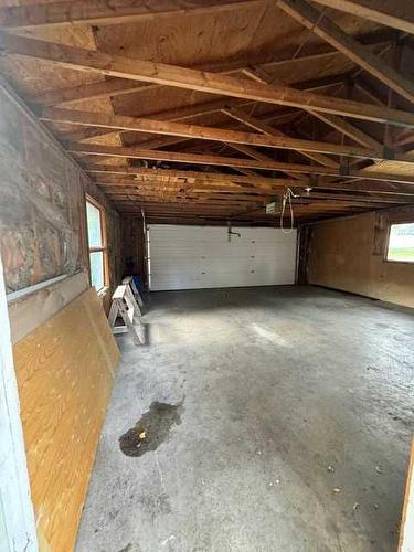 240 Lake Bonavista Drive Se, Calgary, AB - Indoor Photo Showing Garage