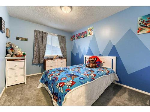 164 Stonemere Place, Chestermere, AB - Indoor Photo Showing Bedroom