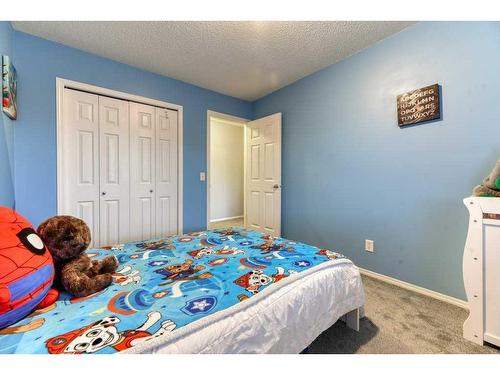 164 Stonemere Place, Chestermere, AB - Indoor Photo Showing Bedroom