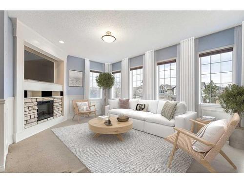 254 Auburn Bay Boulevard Se, Calgary, AB - Indoor Photo Showing Living Room With Fireplace