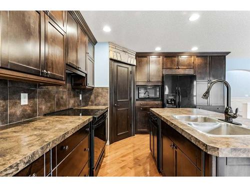 254 Auburn Bay Boulevard Se, Calgary, AB - Indoor Photo Showing Kitchen With Double Sink