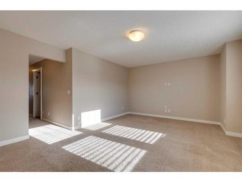 1170 Kings Heights Way Se, Airdrie, AB - Indoor Photo Showing Other Room