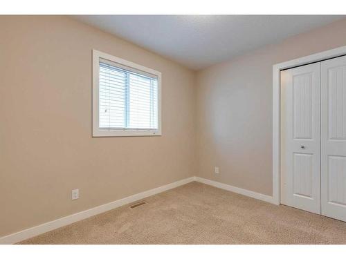 1170 Kings Heights Way Se, Airdrie, AB - Indoor Photo Showing Other Room