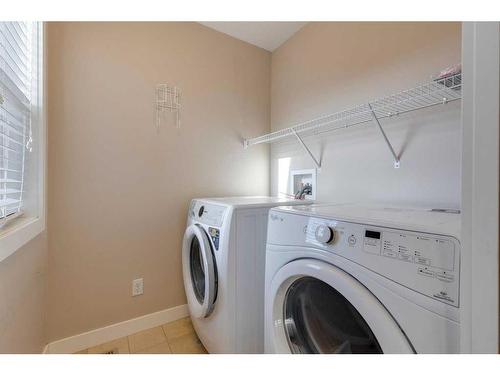 1170 Kings Heights Way Se, Airdrie, AB - Indoor Photo Showing Laundry Room