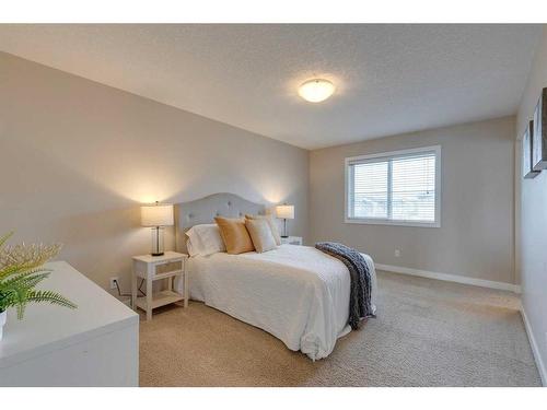 1170 Kings Heights Way Se, Airdrie, AB - Indoor Photo Showing Bedroom