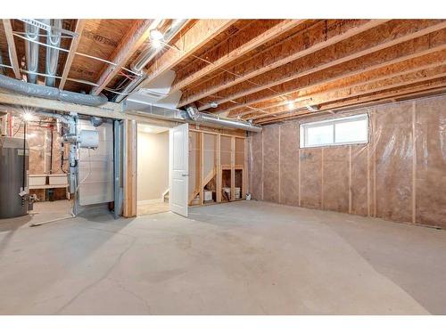 1170 Kings Heights Way Se, Airdrie, AB - Indoor Photo Showing Basement