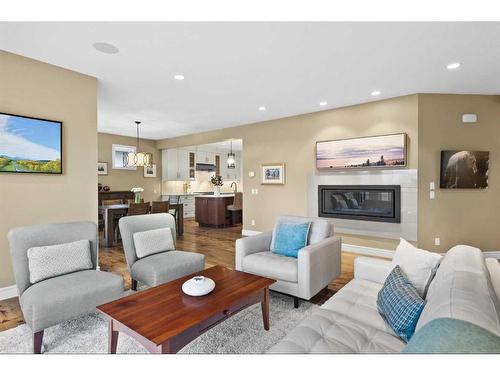 116 Cranarch Heights Se, Calgary, AB - Indoor Photo Showing Living Room With Fireplace