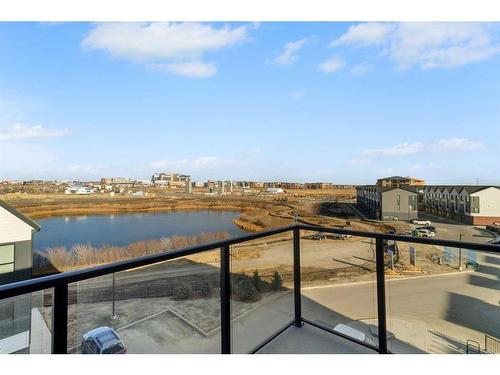 6414-20295 Seton Way Se, Calgary, AB - Outdoor With Body Of Water With Balcony With View