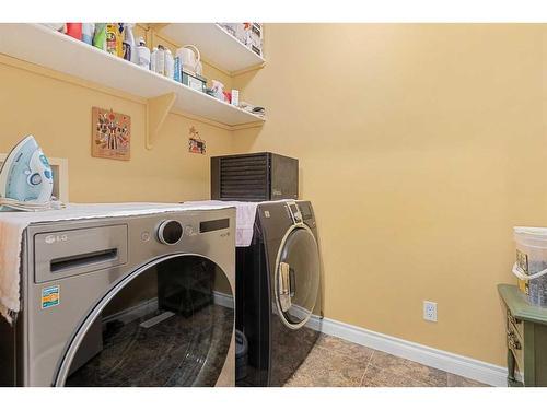 55 Chapman Way Se, Calgary, AB - Indoor Photo Showing Laundry Room