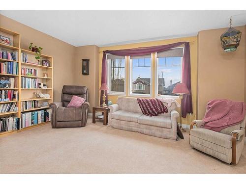 55 Chapman Way Se, Calgary, AB - Indoor Photo Showing Living Room