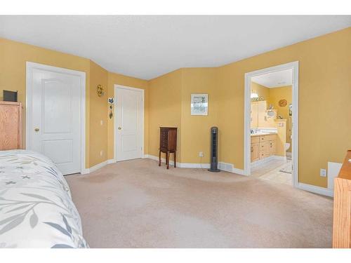 55 Chapman Way Se, Calgary, AB - Indoor Photo Showing Bedroom