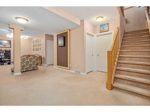 55 Chapman Way Se, Calgary, AB - Indoor Photo Showing Other Room