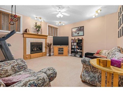 55 Chapman Way Se, Calgary, AB - Indoor With Fireplace